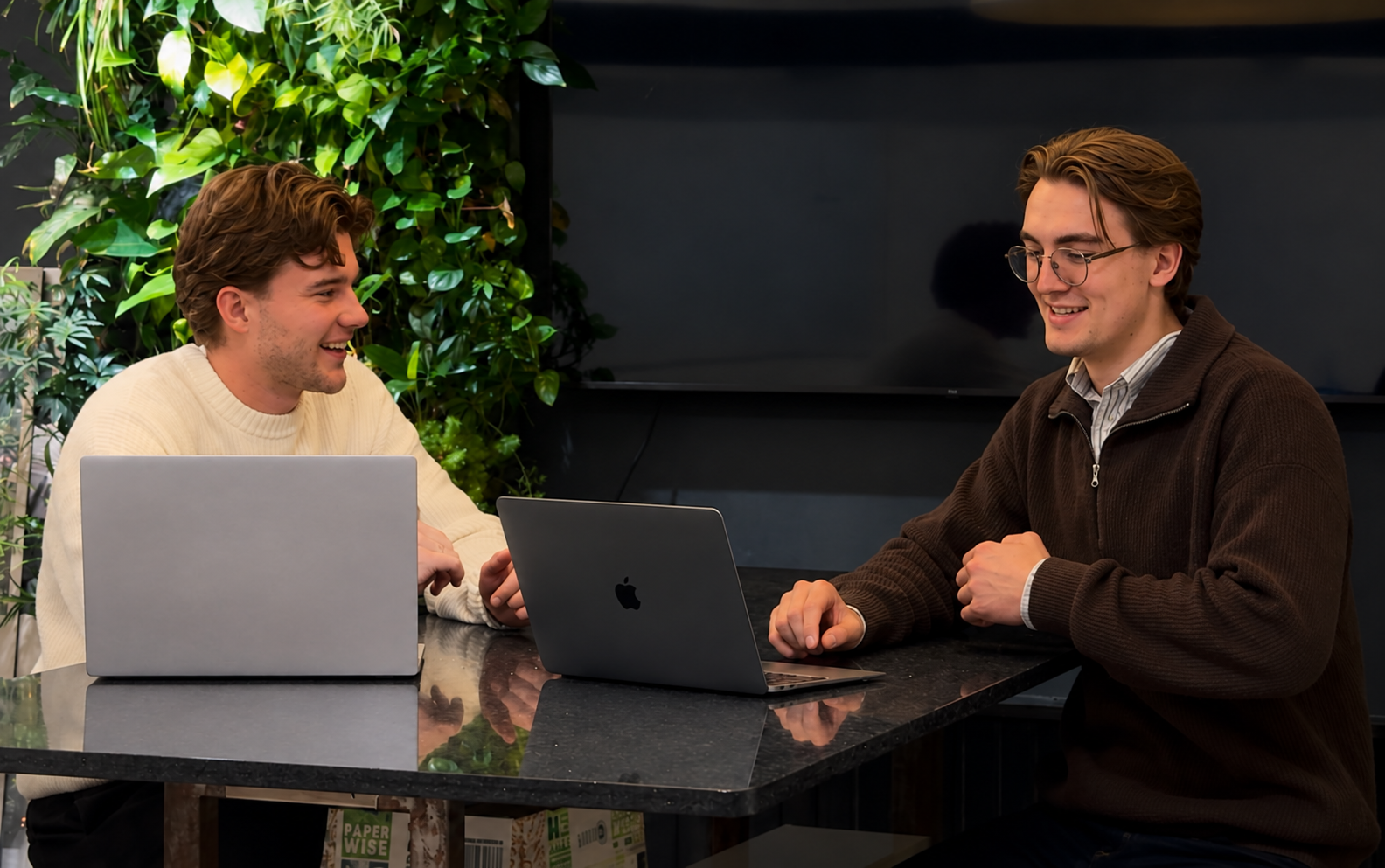 Pieter and Thomas working together at their laptops